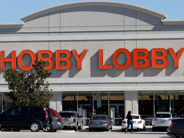 Customers walk into a Hobby Lobby Thursday, Nov. 1, 2012, in Dallas. An arts and craft supply chain that wants to block enforcement of part of a new health care law that requires employers to cover insurance costs for the morning-after pill and the week-after pill is heading to court. (AP Photo/Tony Gutierrez)