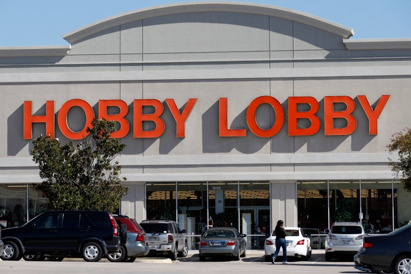 Customers walk into a Hobby Lobby Thursday, Nov. 1, 2012, in Dallas. An arts and craft supply chain that wants to block enforcement of part of a new health care law that requires employers to cover insurance costs for the morning-after pill and the week-after pill is heading to court. (AP Photo/Tony Gutierrez)