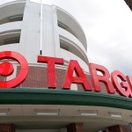 FILE - This Monday, Aug. 11, 2015, file photo, shows a Target store in Miami. Target is making a stand on the debate around what type of bathrooms transgender people can use. In a statement posted on its company website Tuesday, April 19, 2016, the discounter, based in Minneapolis, said transgender employees and customers can use the restroom or fitting room facility that "corresponds with their gender identity." (AP Photo/Lynne Sladky, File)