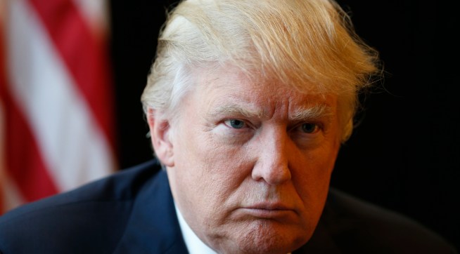 Republican Presidential candidate Donald Trump listens to a question during an interview after a rally in Virginia Beach, Va., Monday, July 11, 2016. (AP Photo/Steve Helber)