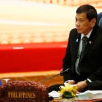 Philippine President Rodrigo Duterte sits for the retreat session in the ongoing 28th and 29th ASEAN Summits and other related summits at the National Convention Center Wednesday, Sept. 7, 2016 in Vientiane, Laos.(AP Photo/Bullit Marquez)