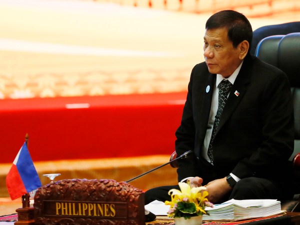 Philippine President Rodrigo Duterte sits for the retreat session in the ongoing 28th and 29th ASEAN Summits and other related summits at the National Convention Center Wednesday, Sept. 7, 2016 in Vientiane, Laos.(AP Photo/Bullit Marquez)