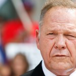 Alabama Chief Justice Roy Moore speaks to the media during a press conference, Monday, Aug. 8, 2016, in Montgomery, Ala. The chief justice continues to fight against gay marriage in Alabama. Moore has been suspended from office after the Judicial Inquiry Commission accused him of violating the canons of judicial ethics with his actions during the fight over same-sex marriage. Moore will attend a hearing Monday that will determine the course of the judicial ethics case against the suspended Alabama Chief Justice. (AP Photo/Brynn Anderson)