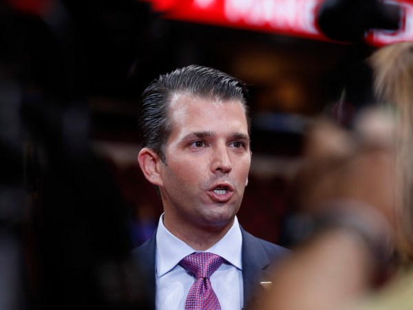 Donald Trump Jr., son of of Republican Presidential Candidate Donald Trump, talks to reporters after his sound check before the start of the second day session of the Republican National Convention in Cleveland, Tuesday, July 19, 2016. (AP Photo/Carolyn Kaster)