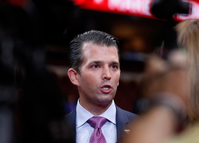 Donald Trump Jr., son of of Republican Presidential Candidate Donald Trump, talks to reporters after his sound check before the start of the second day session of the Republican National Convention in Cleveland, Tuesday, July 19, 2016. (AP Photo/Carolyn Kaster)