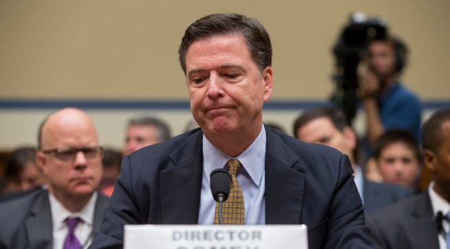 FBI Director James Comey testifies under oath before the House Oversight Committee to explain his agency's recommendation to not prosecute Hillary Clinton, now the Democratic presidential candidate, over her private email setup during her time as secretary of state, on Capitol Hill in Washington, Thursday, July 7, 2016. (AP Photo/J. Scott Applewhite)