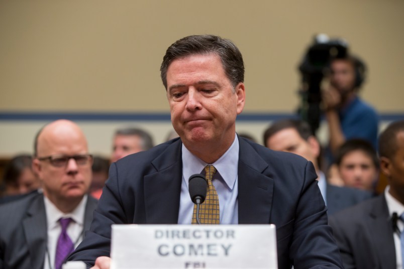 FBI Director James Comey testifies under oath before the House Oversight Committee to explain his agency's recommendation to not prosecute Hillary Clinton, now the Democratic presidential candidate, over her private email setup during her time as secretary of state, on Capitol Hill in Washington, Thursday, July 7, 2016. (AP Photo/J. Scott Applewhite)