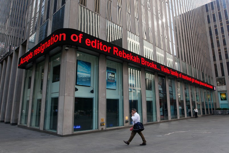 Friday, July 15, 2011 in New York.  Rupert Murdoch accepted the resignation of The Wall Street Journal's publisher and the chief of his British operations on Friday as the once-defiant media mogul struggled to control an escalating phone hacking scandal with apologies to the public and the family of a murdered schoolgirl. The controversy claimed its first victim in the United States as Les Hinton, chief executive of the Murdoch-owned Dow Jones & Co. and publisher of the Wall Street Journal, announced he was resigning, effective immediately. (AP Photo/Mary Altaffer)