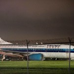 Republican presidential candidate Indiana Gov. Mike Pence's campaign airplane sits partially on the tarmac and the grass after sliding off the runway while landing at LaGuardia airport, Thursday, Oct. 27, 2016, in New York. (AP Photo/Mary Altaffer)