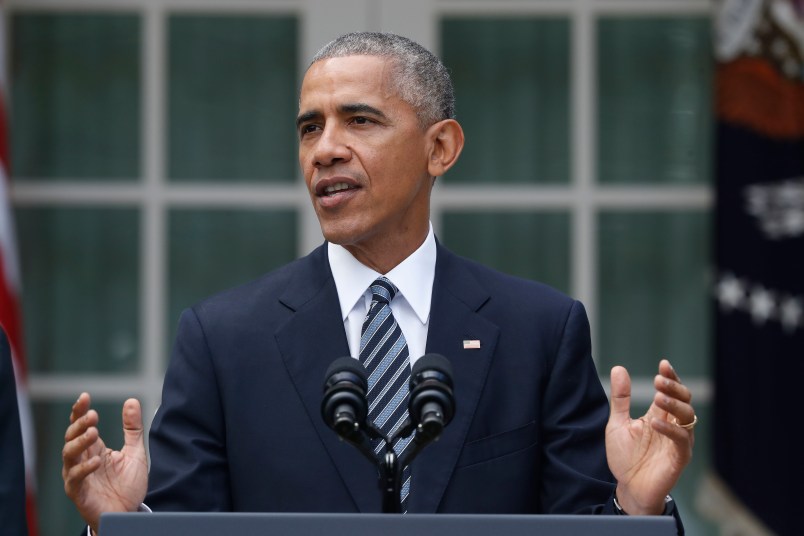 President Barack Obama, accompanied by Vice President Joe Biden, speaks in the Rose Garden of the White House in Washington, Wednesday, Nov. 9, 2016. (AP Photo/Pablo Martinez Monsivais)