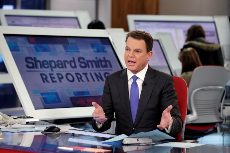 Fox News Channel chief news anchor Shepard Smith broadcasts from The Fox News Deck during his "Shepard Smith Reporting" program, in New York, Monday, Jan. 30, 2017. (AP Photo/Richard Drew)