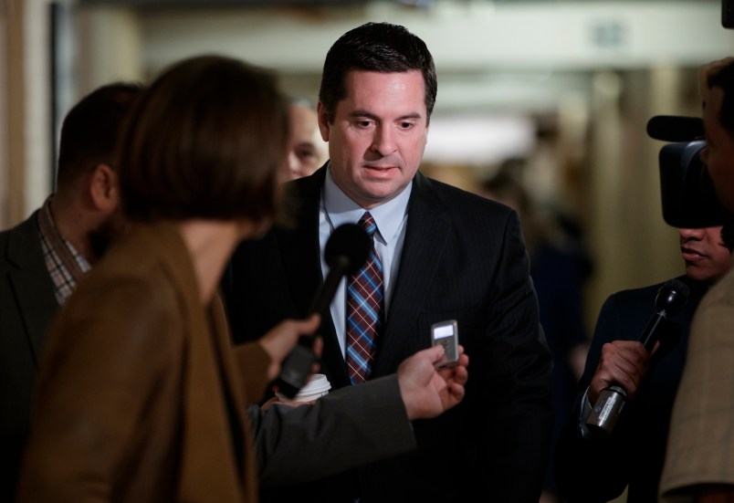 House Intelligence Committee Chairman Devin Nunes, R-Calif., is pursued by reporters as he arrives for a weekly meeting of the Republican Conference with House Speaker Paul Ryan and the GOP leadership, at the Capitol, in Washington, Tuesday, March 28, 2017. (AP Photo/J. Scott Applewhite)