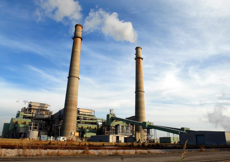 **ADVANCE FOR WEEKEND EDITIONS, DEC. 1-2** Smoke stacks from the NRG power plant located just outside of Jewett, Texas tower over Texas Highway 39, Nov. 28, 2007. The plant provides 250 full-time jobs for Limestone county. Jewett is one of four towns, two in Texas and two in Illinois, competing for the new state-of-the-art FutureGen power plant developers say would emit almost no pollution, turning coal into gas while capturing and storing climate-changing carbon dioxide deep underground. (AP Photo/Nick Simonite)