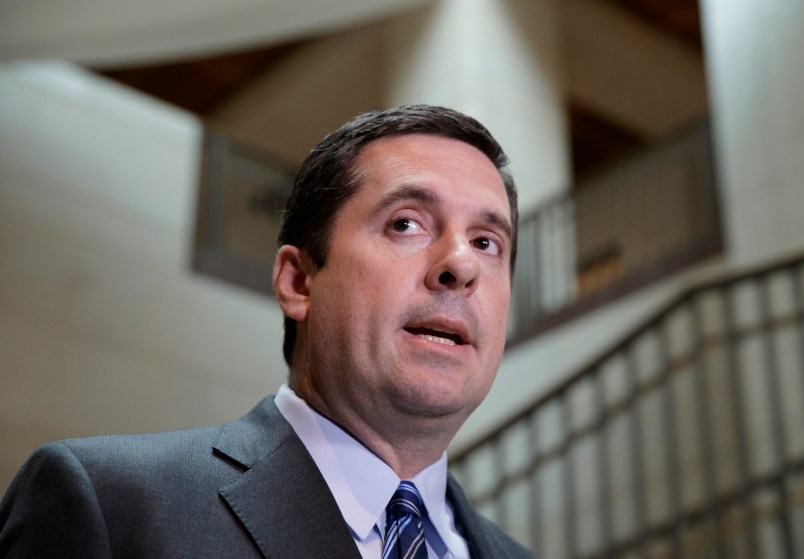 House Intelligence Committee Chairman Devin Nunes, R-Calif., left, speaks to reporters in the Capitol in Washington, Friday, March 24, 2017.  (AP Photo/J. Scott Applewhite)