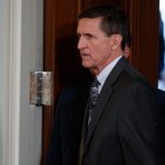 Former National Security Adviser Mike Flynn arrives for a news conference in the East Room of the White House, Monday, Feb. 13, 2017, in Washington. (AP Photo/Evan Vucci)