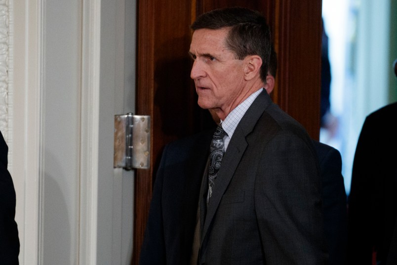 Former National Security Adviser Mike Flynn arrives for a news conference in the East Room of the White House, Monday, Feb. 13, 2017, in Washington. (AP Photo/Evan Vucci)