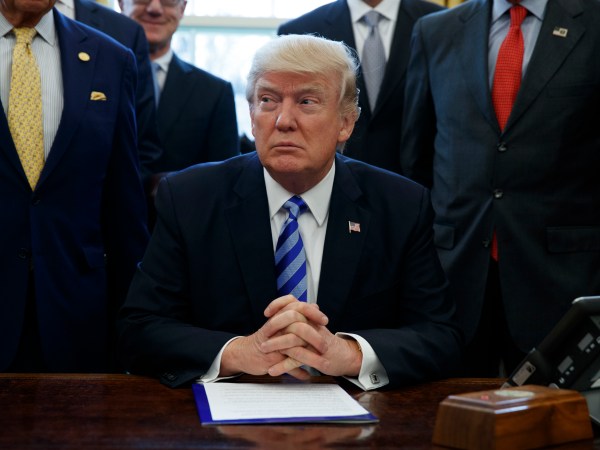 President Donald Trump announces the approval of a permit Friday to build the Keystone XL pipeline, clearing the way for the $8 billion project, in the Oval Office of the White House, Friday, March 24, 2017, in Washington. (AP Photo/Evan Vucci)