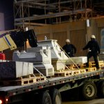 Workers dismantle the Liberty Place monument, one that commemorates whites who tried to topple a biracial post-Civil War government, in New Orleans Monday, April 24, 2017. It was removed overnight in an attempt to avoid disruption from supporters who want the monuments to stay, some of whom city officials said have made death threats. (AP Photo/Gerald Herbert)