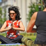 040717-County Court Judge Eleni Derke leads her yoga class on the lawn outside the Duval County Courthouse in Jacksonville, Florida Friday afternoon, April 7, 2017. Judge Derke who handles misdemeanor crimes and civil lawsuits is also a certified yoga instructor and the chairman of the Health Committee of the Jacksonville Bar Association. Judge Derke holds her Yoga on the Lawn class on the first Friday of every month, until the weather gets too hot. (AP Photo/Bob Self/Florida Times-Union)
