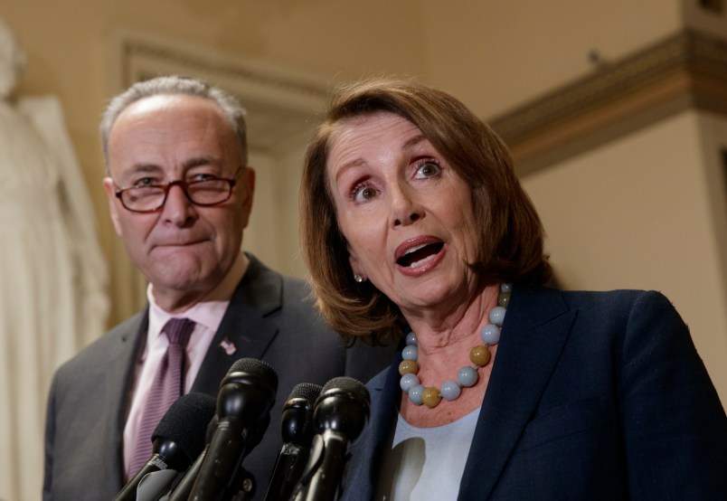 House Democratic Leader Nancy Pelosi of California, and Senate Democratic Leader Chuck Schumer of New York speak to reporters about the Congressional Budget Office projection that 14 million people would lose health coverage under the House Republican bill dismantling former President Barack Obama's health care law, on Capitol Hill in Washington, Monday, March, 13, 2017.  (AP Photo/J. Scott Applewhite)