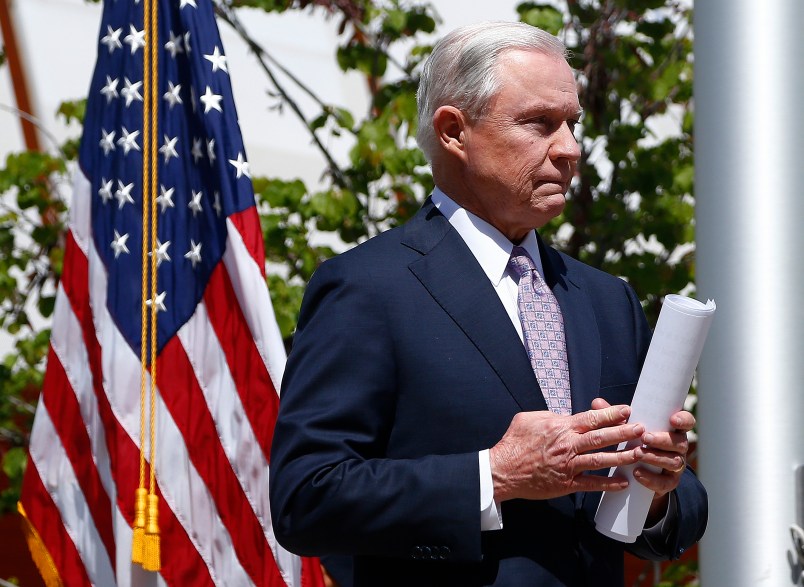 After answering questions, Attorney General Jeff Sessions leaves a press conference after touring the U.S.-Mexico border with border officials Tuesday, April 11, 2017, in Nogales, Ariz.  Sessions announced making immigration enforcement a key Justice Department priority, saying he will speed up deportations of immigrants in the country illegally who were convicted of federal crimes. (AP Photo/Ross D. Franklin)