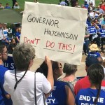 Protesters gather outside the state Capitol building on Friday, April 14, 2017, in Little Rock, Ark., to voice their opposition to Gov. Asa Hutchinson’s plan to put seven men to death between April 17, and April 27, 2017. Hundreds showed up for the rally. (AP Photo/Kelly P. Kissel)