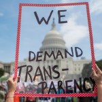 UNITED STATES - APRIL 15: People gather for the Tax March rally on the west lawn of the Capitol to call on President Trump to release his tax returns, April 15, 2017. (Photo By Tom Williams/CQ Roll Call)