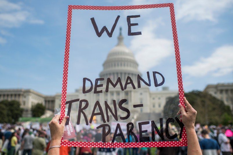 UNITED STATES - APRIL 15: People gather for the Tax March rally on the west lawn of the Capitol to call on President Trump to release his tax returns, April 15, 2017. (Photo By Tom Williams/CQ Roll Call)