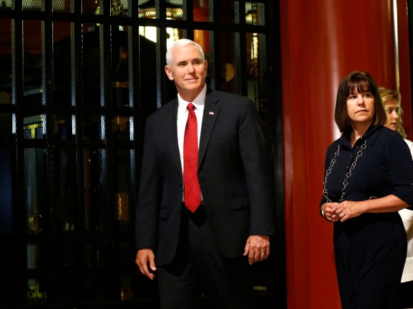 U.S. Vice President Mike Pence, center,  and his wife Karen, second from right, with their daughters visit the main shrine of Sensoji Buddhist temple in Tokyo, Tuesday, April 18, 2017. (AP Photo/Shuji Kajiyama)