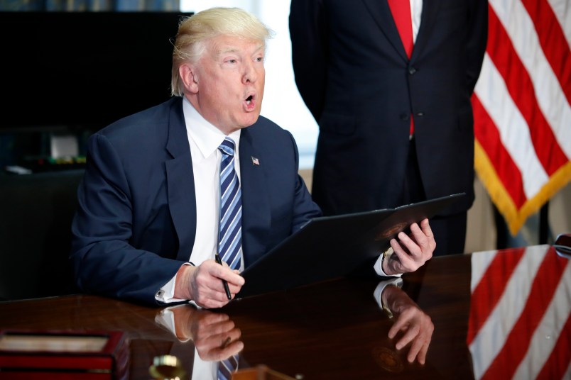 President Donald Trump speaks before signing an Executive Order at the Treasury Department, Friday, April 21, 2017, in Washington. (AP Photo/Alex Brandon)