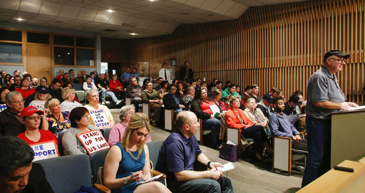 The Lansing City Council chambers were full Wednesday, April 12, 2017, during a special meeting on Lansing's short-lived sanctuary city status.  Citizens from both sides spoke for nearly three hours before the council  voted 5-2 to remove the 'Sanctuary City' designation.