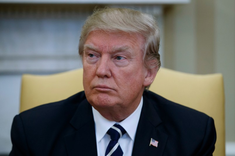 President Donald Trump listens during a meeting with Egyptian President Abdel Fattah al-Sisi in the Oval Office of the White House, Monday, April 3, 2017, in Washington. (AP Photo/Evan Vucci)
