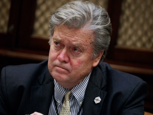 White House chief strategist Steve Bannon listens as President Donald Trump speaks during a meeting with county sheriffs in the Roosevelt Room of the White House in Washington, Tuesday, Feb. 7, 2017. (AP Photo/Evan Vucci)