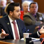 New Hampshire State Rep. Robert Fisher speaks during a public hearing at the Legislative Office Building, Tuesday, May 9, 2017, in Concord, N.H., to defend himself on alleged comments he made online about filming sexual encounters with women and degrading their intelligence. Fisher says his comments have been taken out of context. (AP Photo/Elise Amendola)