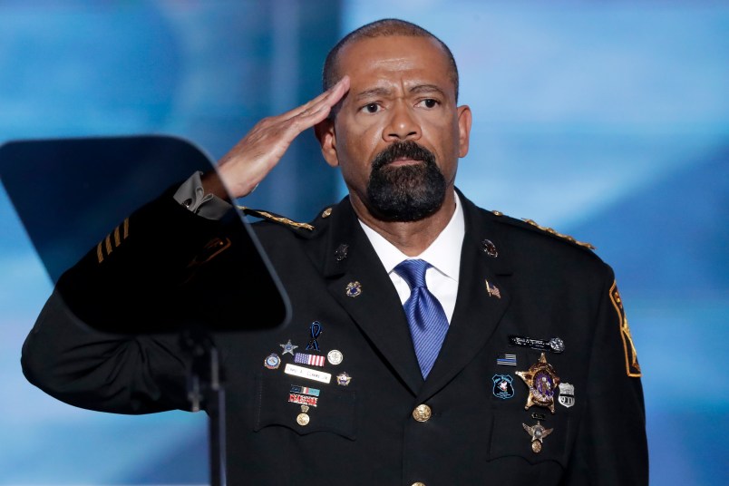 David Clarke, Sheriff of Milwaukee County, Wis., salutes after speaking during the opening day of the Republican National Convention in Cleveland, Monday, July 18, 2016. (AP Photo/J. Scott Applewhite)