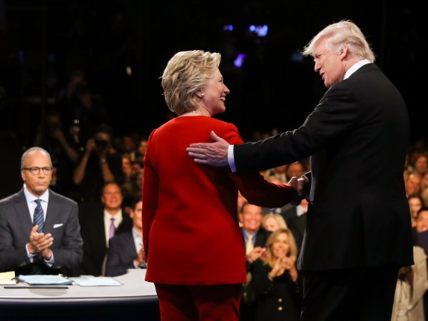 Democratic presidential nominee Hillary Clinton and Republican presidential nominee Donald Trump shake hands during the presidential debate at Hofstra University in Hempstead, N.Y., Monday, Sept. 26, 2016. (Joe Raedle/Pool via AP)