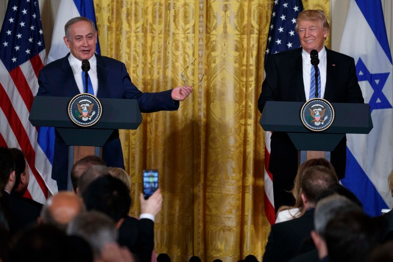 FILE - In this Wednesday, Feb. 15, 2017 file photos, President Donald Trump listens as Israeli Prime Minister Benjamin Netanyahu speaks during their joint news conference in the East Room of the White House,  in Washington. Trump and Netanyahu said at their first joint news conference that they will seize what they believe is an opportunity for an ambitious Israeli-Arab peace deal. (AP Photo/Evan Vucci, File)