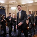 FBI Director James Comey takes a break after three hours of testifying as the House Permanent Select Committee on Intelligence holds its first public hearing on allegations of Russian interference in the 2016 U.S. presidential election and the murky web of contacts between President Donald Trump's campaign and Russia, on Capitol Hill in Washington, Monday, March 20, 2017. (AP Photo/J. Scott Applewhite)
