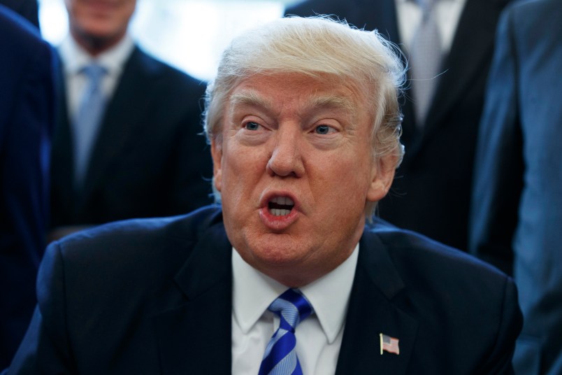 President Donald Trump announces the approval of a permit to build the Keystone XL pipeline, clearing the way for the $8 billion project, Friday, March 24, 2017, in the Oval Office of the White House in Washington. (AP Photo/Evan Vucci)