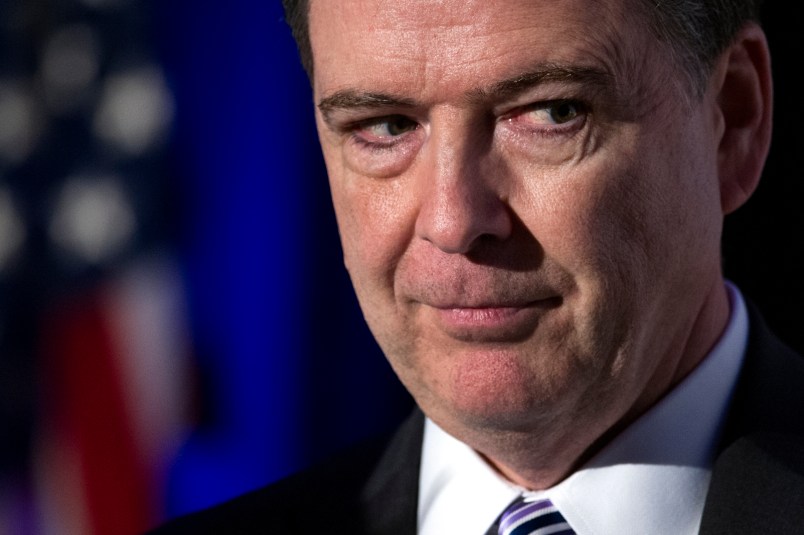 FBI Director James Comey adddresses the Intelligence and National Security Alliance Leadership Dinner in Alexandria, Va., Wednesday, March 29, 2017. (AP Photo/Cliff Owen)