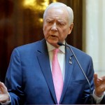 FILE - This Feb. 22, 2017, file photo, Utah Sen. Orrin Hatch speaks to the Utah Senate at the Utah State Capitol, in Salt Lake City. Hatch is introducing a proposal that aims to remedy religious visa delays that the Mormon church says are disrupting the religion's missionary program. Hatch said in a news release Thursday, March 30, 2017,  that some people are waiting nine to 11 months to get the religious visas.  (AP Photo/Rick Bowmer, File)
