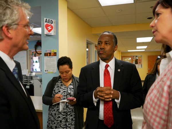 /// Ben Carson, Secretary of Housing and Urban Development, speaks with city and housing officials inside a shelter in Columbus, Ohio on April 26, 2017. Carson told the Associated Press he plans to release an agenda within the next few months that will deliver "bang for the buck" while on a national tour of public housing sites. (AP Photo/Dake Kang)
