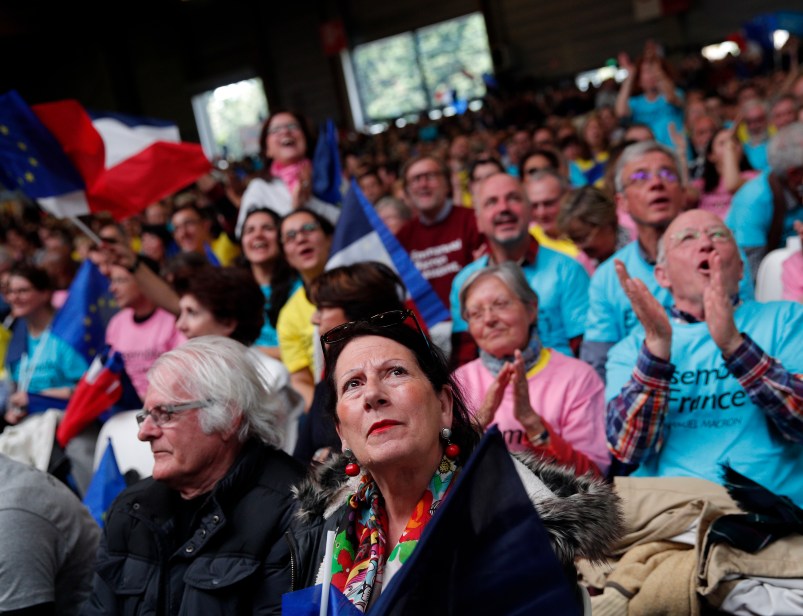 Supporters of French independent centrist presidential candidate Emmanuel Macron attends a campaign rally in Paris, France, Monday, May 1st, 2017. With just six days until a French presidential vote that could define Europe's future, far-right leader Marine Le Pen and centrist Emmanuel Macron are holding high-stakes rallies Monday. (AP Photo/Christophe Ena)