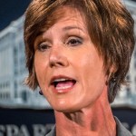 Deputy Attorney General Sally Yates announces the settlement with Volkswagen during a news conference at the Justice Department in Washington, Tuesday, June 28, 2016. Volkswagen will spend more than $15 billion to settle consumer lawsuits and government allegations that it cheated on emissions tests in what lawyers are calling the largest auto-related class-action settlement in U.S. history. (AP Photo/J. David Ake)