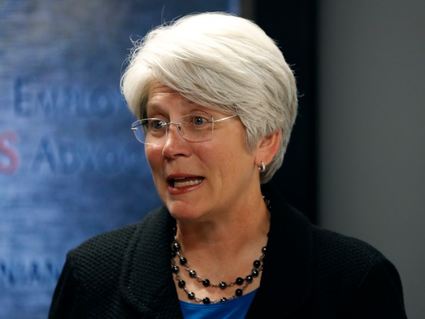 Jane Meyer, former senior associate athletic director at the University of Iowa, speaks during a news conference, Thursday, May 4, 2017, in Des Moines, Iowa. A jury on Thursday awarded more than $1.4 million to Meyer ruling that the university had discriminated against her because of her gender and sexual orientation. (AP Photo/Charlie Neibergall)