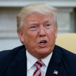 President Donald Trump talks to reporters during a meeting with former Secretary of State Henry Kissinger in the Oval Office of the White House, Wednesday, May 10, 2017, in Washington. (AP Photo/Evan Vucci)