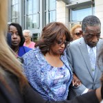Bishop Rudolph W. McKissick, Sr. (left) escorts Former Congresswoman Corrine Brown (right) leaves the Bryan Simpson United States Courthouse on the arm of Bishop Rudolph W. McKissick, Sr. after being found guilty on 18 of 22 counts. (AP Photo/Bruce Lipsky/Florida Times-Union)