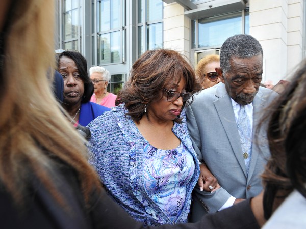 Bishop Rudolph W. McKissick, Sr. (left) escorts Former Congresswoman Corrine Brown (right) leaves the Bryan Simpson United States Courthouse on the arm of Bishop Rudolph W. McKissick, Sr. after being found guilty on 18 of 22 counts. (AP Photo/Bruce Lipsky/Florida Times-Union)