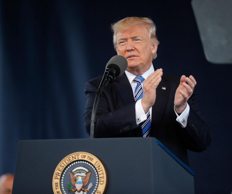 President Donald Trump applauds the Class of 2017 as he gives the commencement address at Liberty University in Lynchburg, Va., Saturday, May 13, 2017. (AP Photo/Pablo Martinez Monsivais)