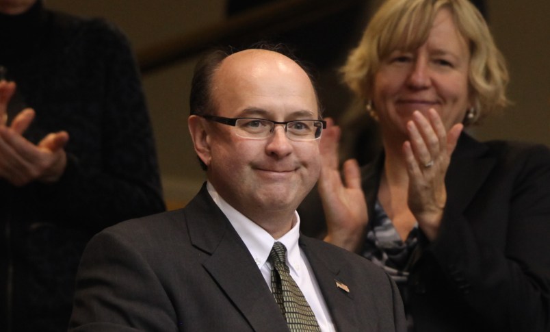 Newly-elected Secretary of State Matt Dunlap is stands after the results were announced Wednesday, Dec. 5, 2012  during a joint convention to elect constitutional officers in Augusta, Maine. (AP Photo/Joel Page)